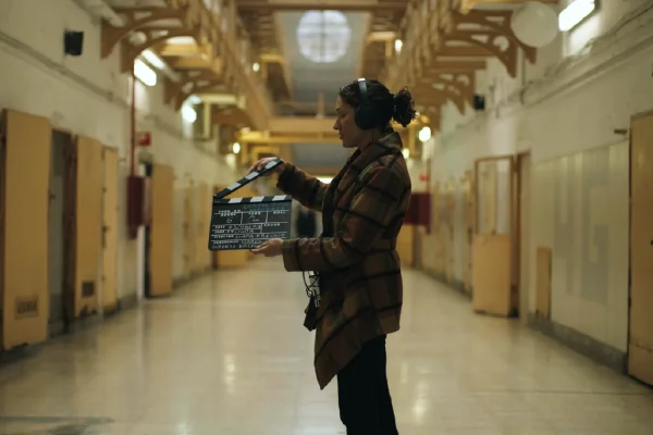 Photo inside the prison, clapperboard behind the scenes – Window on Death Row documentary